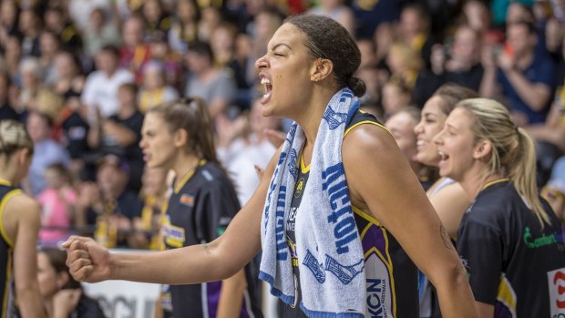Liz Cambage cheers on her Boomers teammates from the bench.