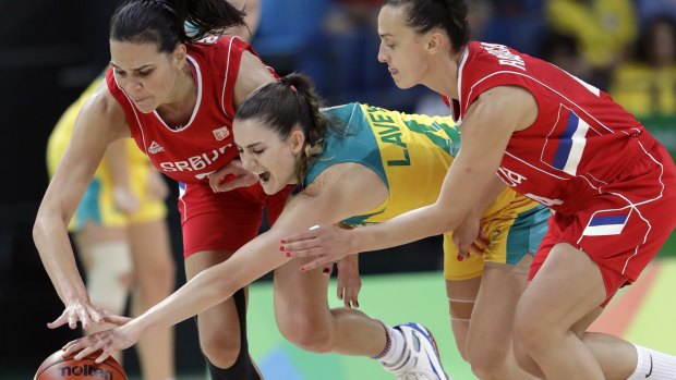 Australia's Tessa Lavey, centre, scrambles for a loose ball.