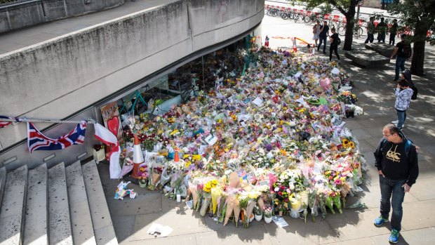 Floral tributes left at the south end of London Bridge.
