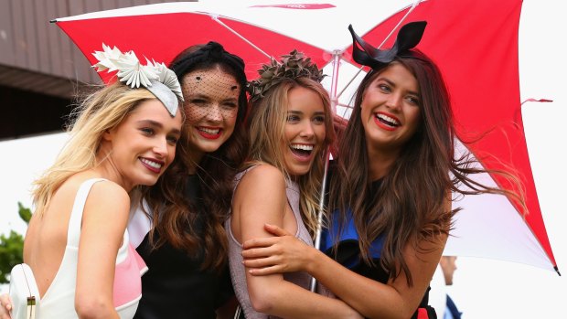 An umbrella was an essential accessory on Tuesday's Melbourne Cup.