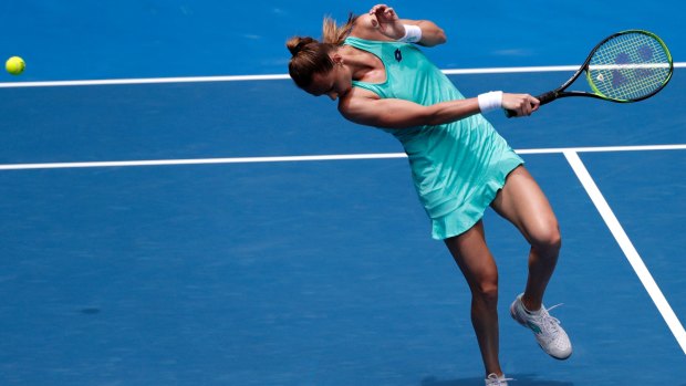 Slovakia's Magdalena Rybarikova reacts as she avoids a shot from Denmark's Caroline Wozniacki.