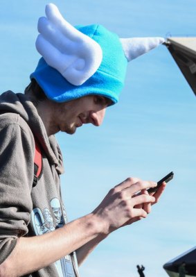 A Pokemon Go fan about in Sydney on Sunday.