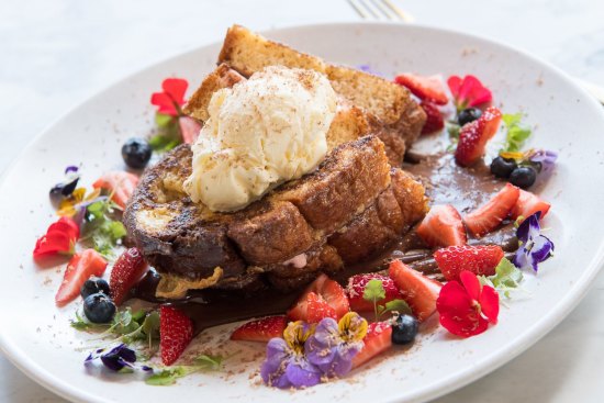 French toast sandwiched with strawberry cheesecake served with toasted coconut ice-cream.