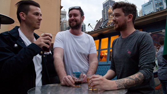 Corey Wakefield, Mike Harding and  Daniel Langton have a drink after work. 