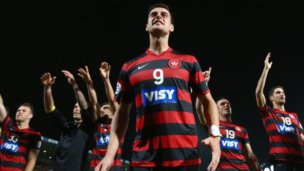Tomi Juric of the Wanderers celebrates with his team in front of the crowd after victory during the Asian Champions League final match between the Western Sydney Wanderers and Al Hilal at Pirtek Stadium on October 25, 2014.