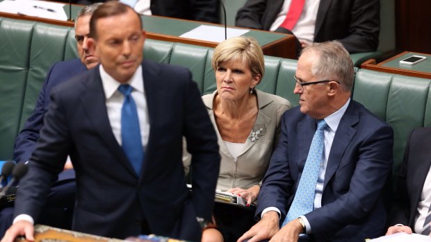 Now: Prime Minister Tony Abbott, Foreign Affairs Minister Julie Bishop and  Communications Minister Malcolm Turnbull in Parliament.