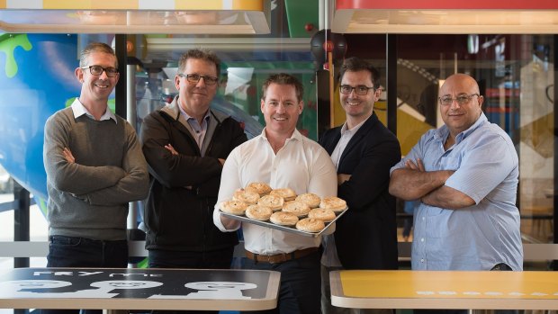 Garlo's Pies managing director Sean Garlick (centre) with  McDonald's ACT licensees (from left) Bradley Carroll, Craig Coleman, Ben Stockbridge and Hani Sidaros.
