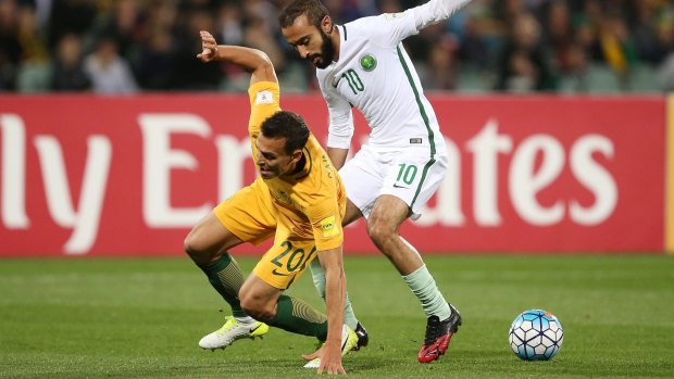 Trent Sainsbury is tackled by Saudi Arabia's Mohammed Al Sahlawi during last week's qualifier