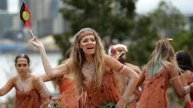 Indigenous artists perform the WugulOra morning ceremony at Barangaroo Reserve on Australia Day last year.