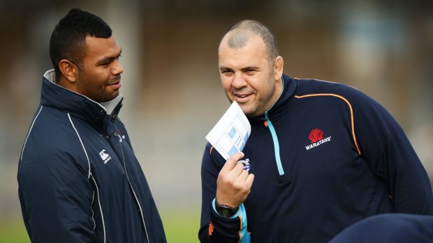 Super coach: Michael Cheika (right) got the best out of Kurtley Beale during the NSW Waratahs' title-winning Super Rugby campaign.