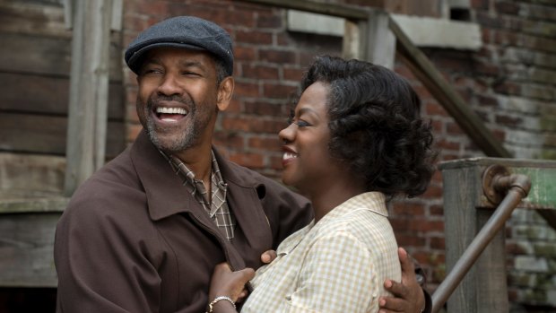 Imperfect hero: Denzel Washington as Troy, the trash man who is a tyrant in his own castle, with Viola Davis as his wife, Rose.