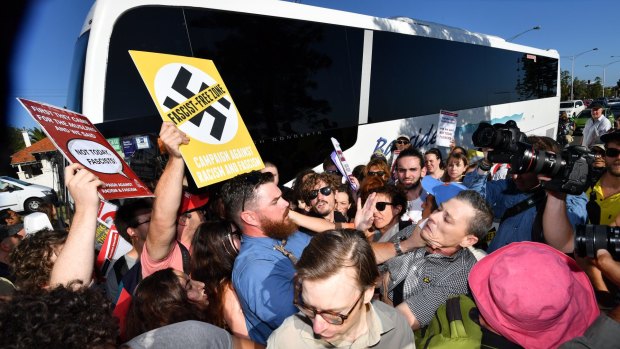 Anti-racist activists stop Q Society members boarding a bus at St Kilda Marina.