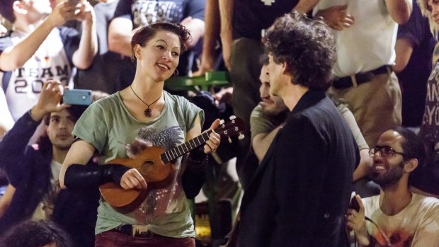 Gaiman with his wife Amanda Palmer performing at a free show in Tel Aviv, Israel. 