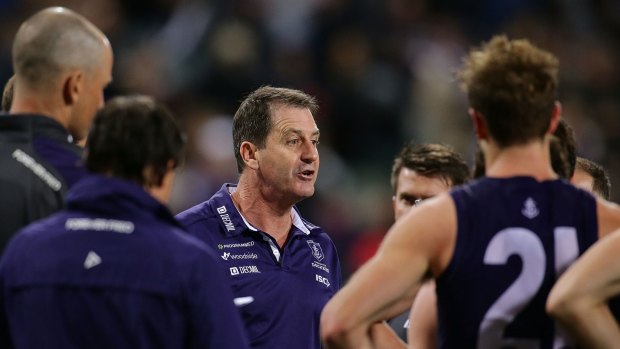 Coach Ross Lyon gets his playing group on message.