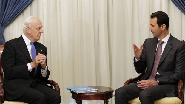 Syrian President Bashar al-Assad, right, speaks with United Nations envoy to Syria Staffan de Mistura in Damascus in November.
