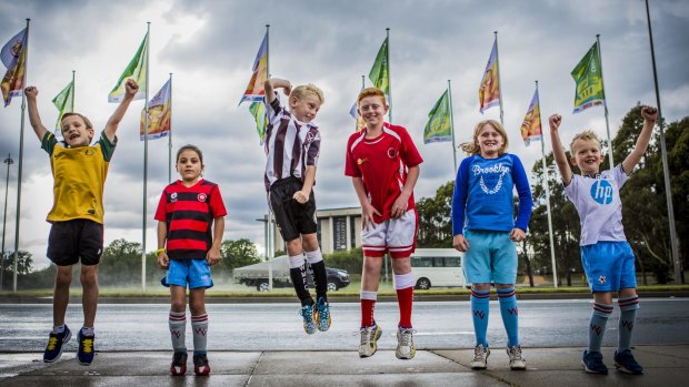 The flags have been raised along Commonwealth Avenue in celebration for the upcoming Asian Cup. These excited kids (From left), Will Davis 7, Kaitlyn Colwill 8, Josh Heddith 10, Daniel Findlay 9, Eloise Jamet 9, and Lucas Carey 6, will experience the passion.

The Canberra Times.
