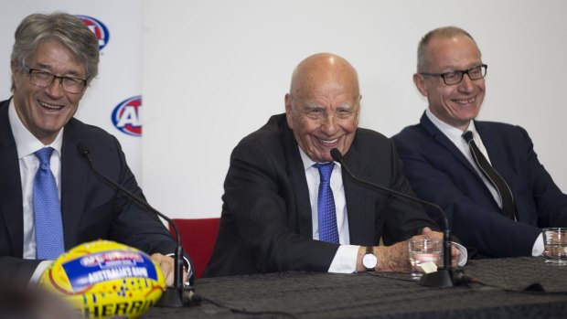 News executives Mike Fitzpatrick, Rupert Murdoch and Robert Thompson announce a 2 billion dollar Foxtel deal at AFL Headquarters in 2015.
