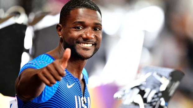Justin Gatlin defied the boos from around the stadium to win the 100m world title.