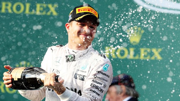 Celebrations: Nico Rosberg cracks open the bubbly