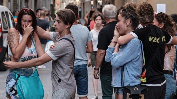 Pedestrians in shock moments after the van drove through crowds on Las Ramblas in Barcelona.