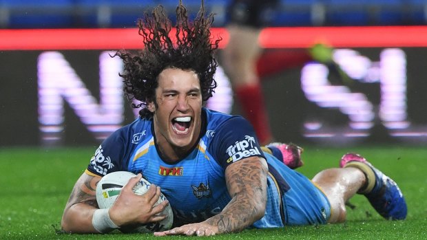 Hair-raising stuff: Kevin Proctor has gone into bat for embattled Titans coach Neil Henry.