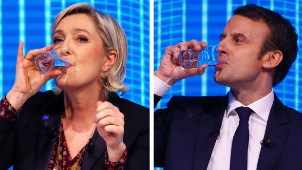 Marine Le Pen and Emmanuel Macron during Re-invest France, the first of three televised debates before presidential elections next month.