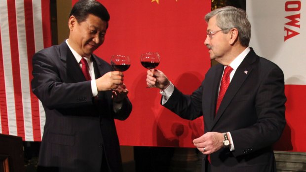 Terry Branstad, right, with then Chinese Vice President Xi Jinping in Iowa in 2012. 
