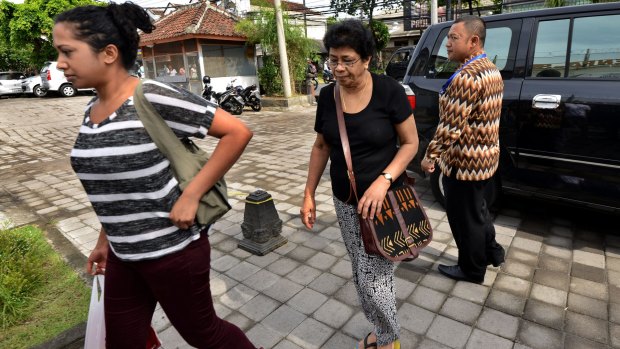 Family members of Myuran Sukumaran arrive to visit him at Kerobokan prison on Thursday, after officials announced the two death row prisoners would be transferred for execution.