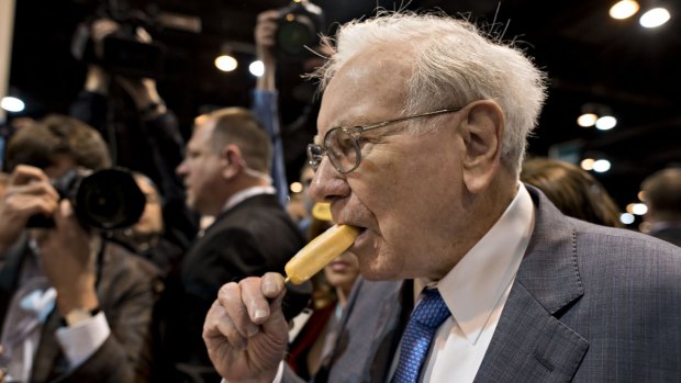 Warren Buffett tours the exhibition floor at the Berkshire Hathaway annual shareholders meeting.