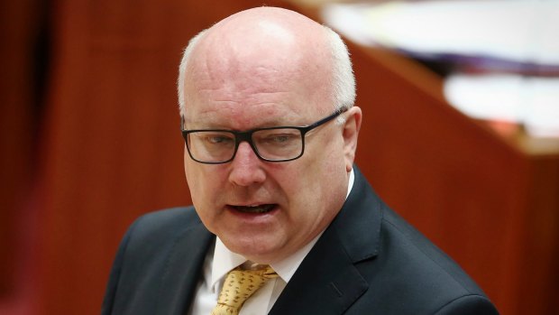Attorney-General George Brandis will introduce new laws targeting foreign spies, agents and donations to parliament by the end of the year.