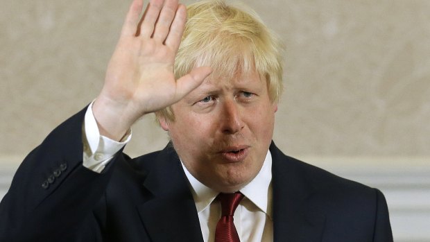 Former London mayor Boris Johnson waves after announcing he will not run for leadership.