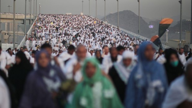 Crush: Hundreds of thousands of pilgrims make their way to perform the last rite of the Haj.
