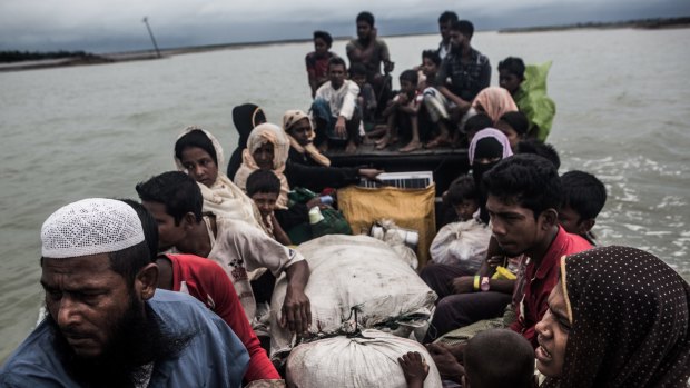 Rohingya refugees arrive by boat from Myanmar, near Teknaf, Bangladesh in September. 