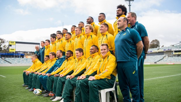 The Wallabies pose for a team photo at GIO Stadium before their match against Argentina on Saturday. 