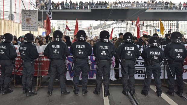 Police secure the streets during a counter demonstration against far-right groups  in Cologne on Sunday.