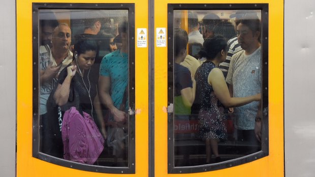 Trains arriving at Strathfield already full of commuters on Thursday morning. 