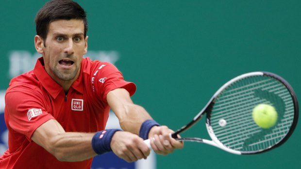 Novak Djokovic returns a shot against Mischa Zverev in the quarter-finals of the  Shanghai Masters.