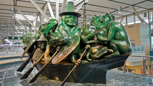 The Spirit of Haida Gwaii: The Jade Canoe by indigenous sculptor Bill Reid, at Vancouver International Airport. 