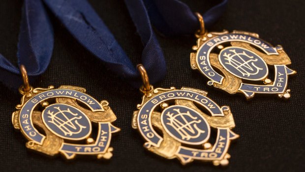The three Brownlow medals won by Essendon great Dick Reynolds are going under the hammer next month.