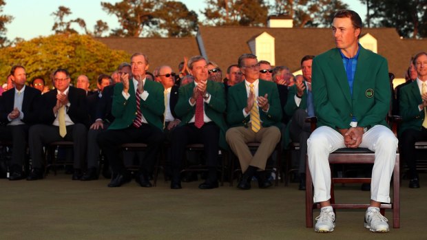 Tough school: Jordan Spieth reacts after presenting Danny Willett with the green jacket after the Englishman won the Masters.