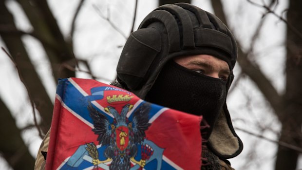 Pro-Russian rebels in tanks and heavy weaponry move away from the front line of fighting in accordance with the Minsk II agreement on February 26, 2015 in Chervonoe, Ukraine. 