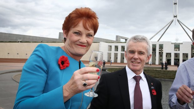 Senator Pauline Hanson is seen here toasting Donald Trump's victory with Senator Malcolm Roberts.