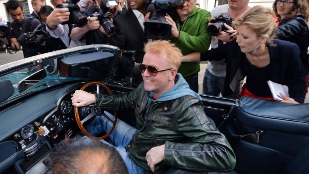 New Top Gear host Chris Evans at the wheel of his vintage Aston Martin.