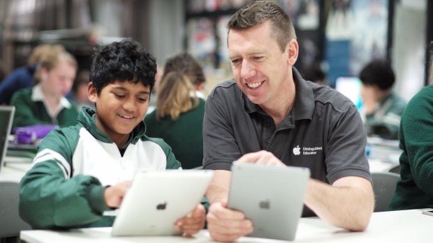 Sharpening skills: Manu Multani, left, and teacher Rick Connors from Wanganui Park Secondary College in Shepparton. Apps give students more control over their learning and, for country students, access to opportunities they might otherwise not have.