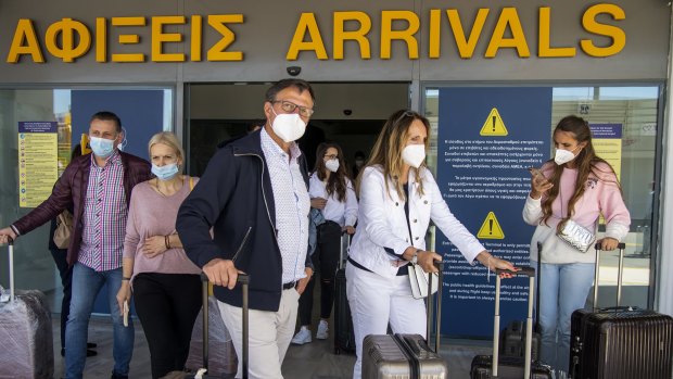 Passengers arrive at Nikos Kazantzakis International Airport on the island of Crete in Greece.