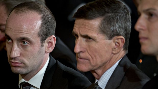 Stephen Miller, White House senior adviser for policy, left, Michael Flynn and Jared Kushner listen during a news conference with US President Donald Trump and Canadian Prime Minister Justin Trudeau. Hours later Flynn was gone.