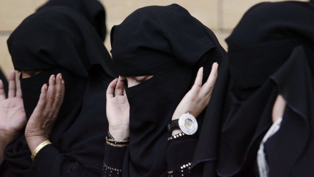 The conservative Muslim country enforces a strict dress code for women in public