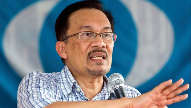 Malaysia's former deputy prime minister Anwar Ibrahim delivers a by-election campaign speech in 2007.