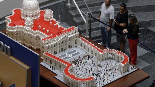 Visitors view a Lego representation of the St. Peter's basilica and square, at The Franklin Institute in Philadelphia, ahead of Francis' visit. (AP Photo/Matt Rourke)