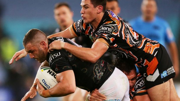 Old stager: Robbie Farah takes Mitchell Moses for a ride.